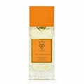 Bujairami Too Damn Good — Clear faceted glass perfume bottle with wooden cap next to orange leather box with gold logo