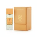 Bujairami Too Damn Good — Clear faceted glass perfume bottle with wooden cap next to orange leather box with gold logo