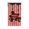 Grandeur Tubbees Chocolate Fudge — A perfume bottle with a chocolate-colored spherical cap and pink and white striped body, with chocolate drips cascading down. Next to it is the product box with the same design. | Grandeur Tubbees Chocolate Fudge — Botol minyak wangi dengan penutup bulat berwarna coklat dan badan