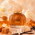 Maison Asrar Vanilla Voyage — Amber glass perfume bottle with a textured peach cap and gold trim, next to its peach box with a perfume silhouette.