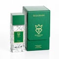 Bujairami Vibration by Bujairami 100ml Extrait de Parfum — Clear glass bottle with green cap and label next to a green