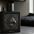 Rayhaan Wolf by Rayhaan 100ml EDP for Men — Black perfume bottle and box with embossed gold wolf head design, set against a white background.