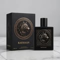 Rayhaan Wolf by Rayhaan 100ml EDP for Men — Black perfume bottle and box with embossed gold wolf head design, set against a white background.