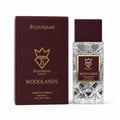 Bujairami Woodlands — Maroon box and faceted glass perfume bottle with gold accents and logo